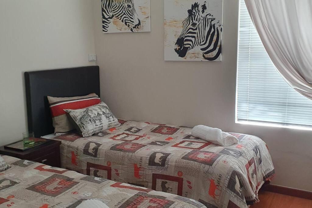 Apartment Sua Casa Has African Inspired Decor